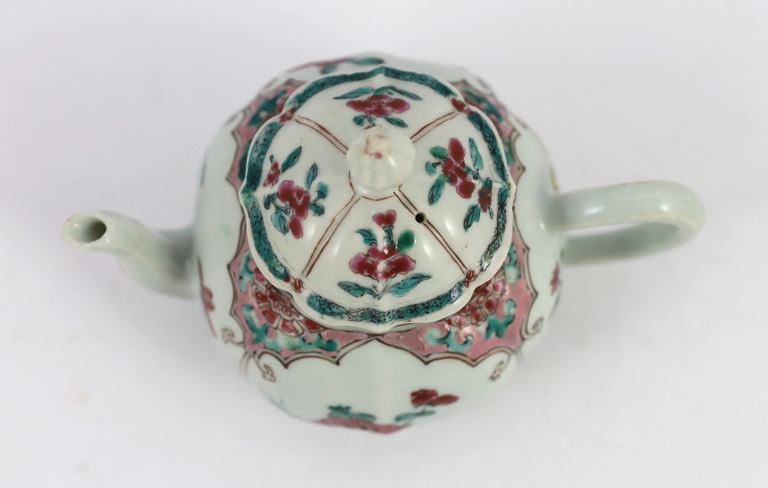 A Chinese famille rose petal lobed teapot, Yongzheng period, minor faults